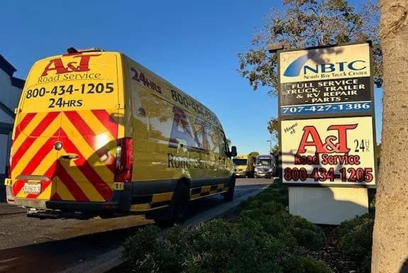 Class A motorhome chassis backed into a daylight Fairfield shop bay